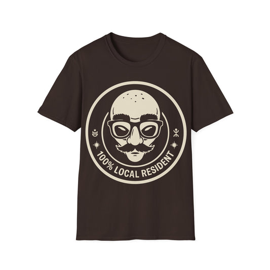 100% Local Resident t-shirt design, featuring a disguised alien face with glasses, thick eyebrows, fake nose, and mustache inside a cream circular badge with cosmic symbols on a dark chocolat brown background