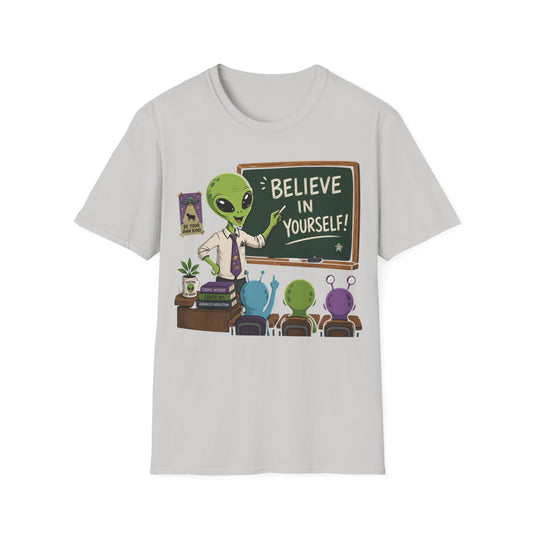 Believe in Yourself t-shirt design, featuring a cheerful green alien teacher pointing to a chalkboard while colorful alien students sit in a playful classroom scene on an ice grey background