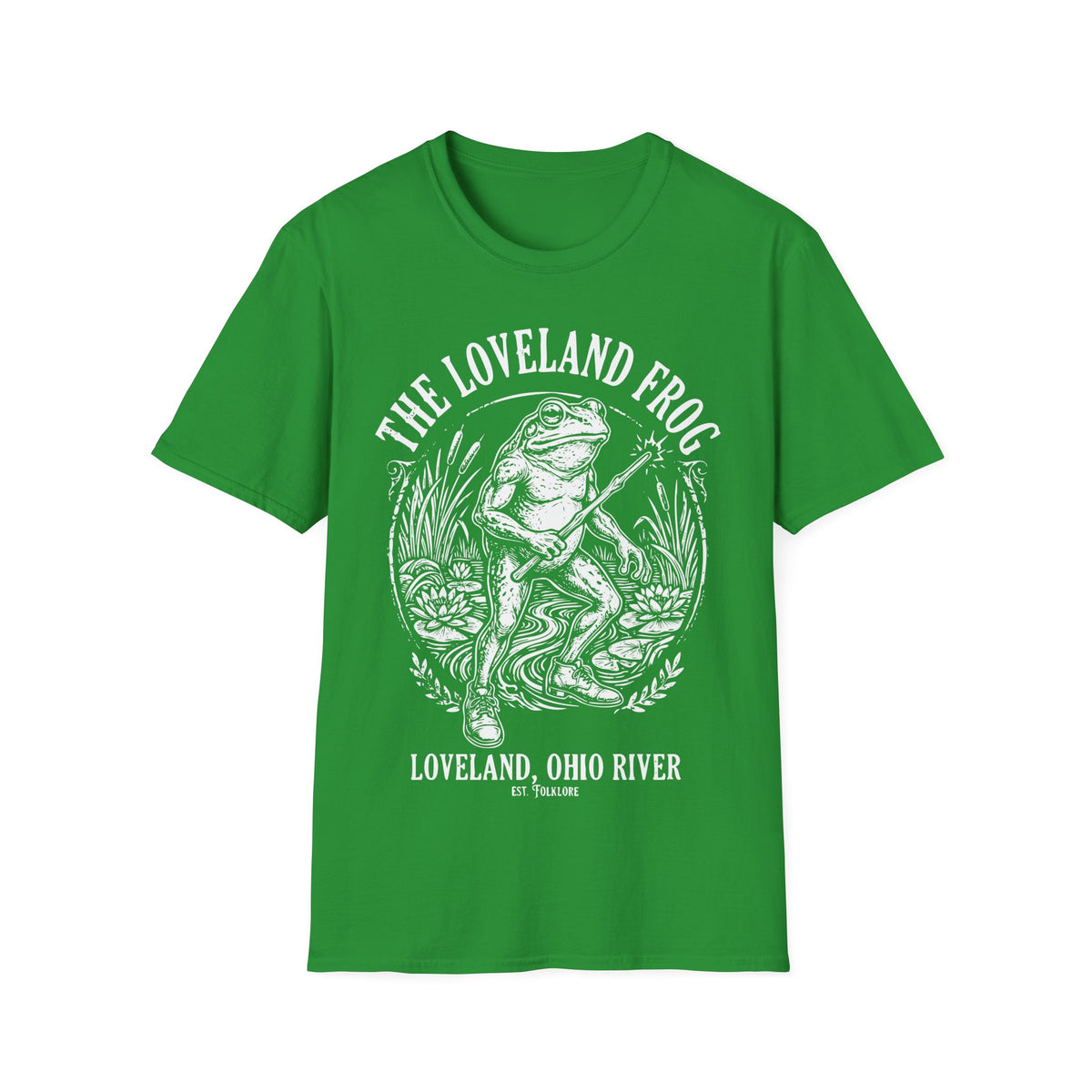 Loveland Frog t-shirt design, featuring a humanoid frog holding a glowing wand in a marsh filled with reeds and lily pads, framed by bold “The Loveland Frog” and “Loveland, Ohio River” lettering in a detailed vintage folklore illustration on an irish green background
