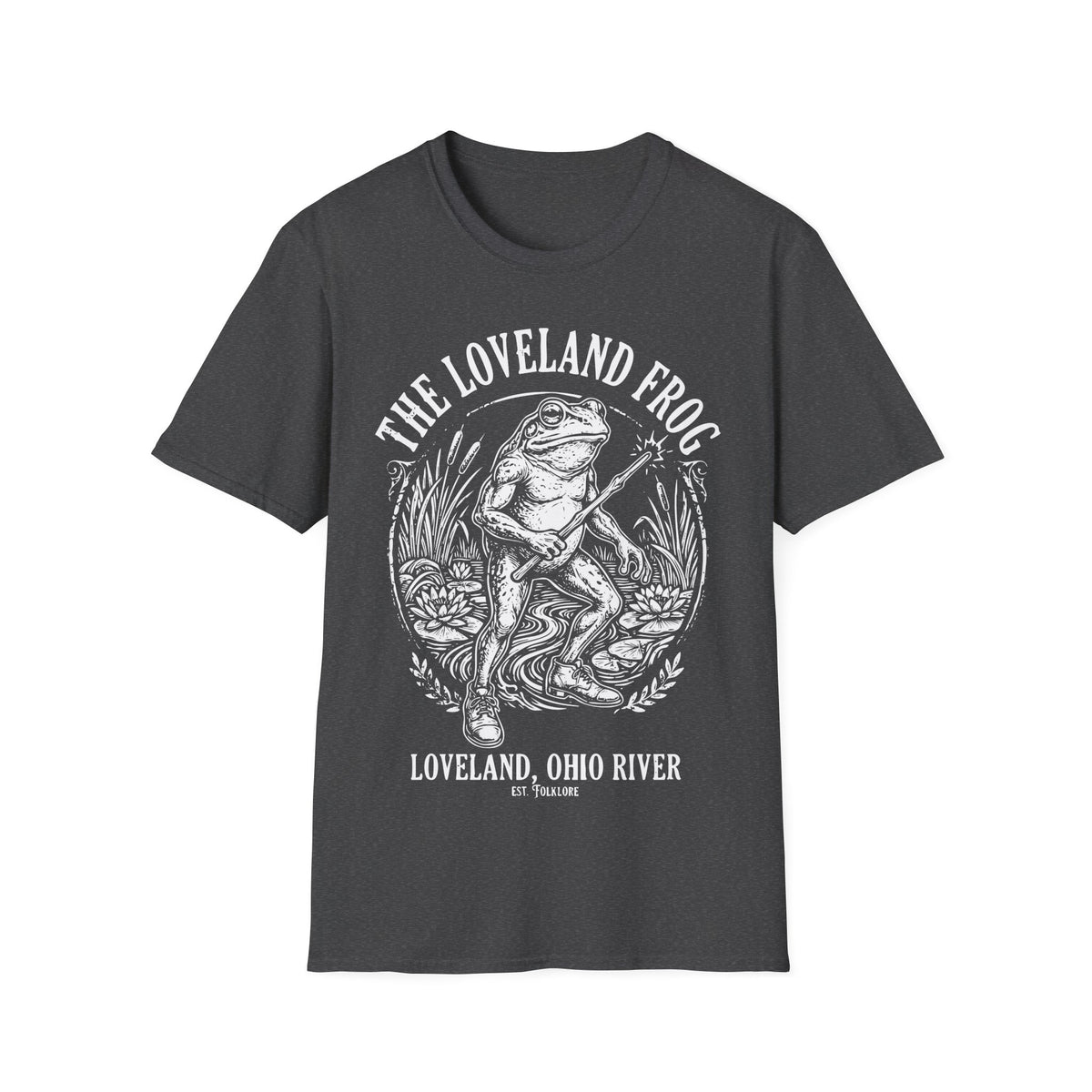 Loveland Frog t-shirt design, featuring a humanoid frog holding a glowing wand in a marsh filled with reeds and lily pads, framed by bold “The Loveland Frog” and “Loveland, Ohio River” lettering in a detailed vintage folklore illustration on a dark heather grey background