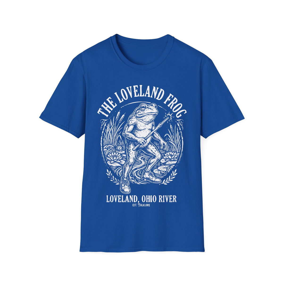 Loveland Frog t-shirt design, featuring a humanoid frog holding a glowing wand in a marsh filled with reeds and lily pads, framed by bold “The Loveland Frog” and “Loveland, Ohio River” lettering in a detailed vintage folklore illustration on a royal blue background