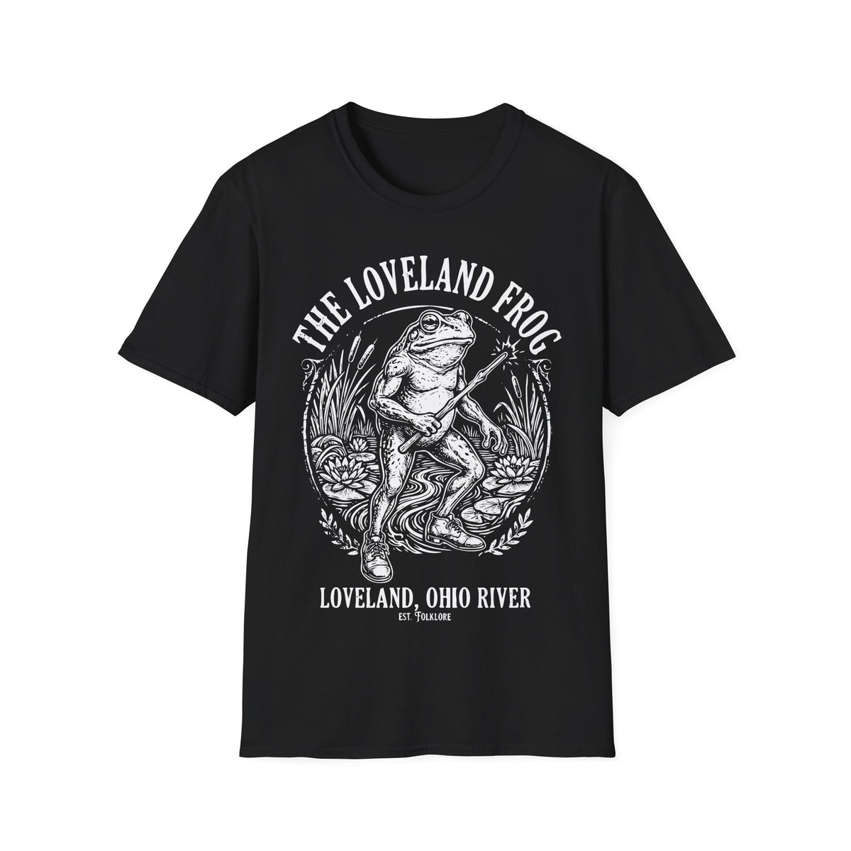 Loveland Frog t-shirt design, featuring a humanoid frog holding a glowing wand in a marsh filled with reeds and lily pads, framed by bold “The Loveland Frog” and “Loveland, Ohio River” lettering in a detailed vintage folklore illustration on a black background
