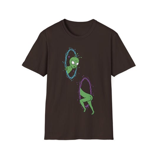 The Portal t-shirt design, featuring a confused green alien awkwardly passing through two glowing cosmic portals, with its head emerging from one and body disappearing into another in a funny cartoon style on a dark chocolate brown background