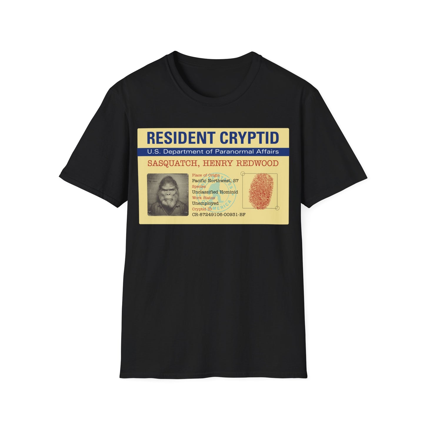 Resident Cryptid ID Card t-shirt design featuring a vintage government style Sasquatch/Bigfoot ID badge with mugshot portrait, fingerprint, and ‘U.S. Department of Paranormal Affairs’ dossier text in beige, blue, and red on a black background
