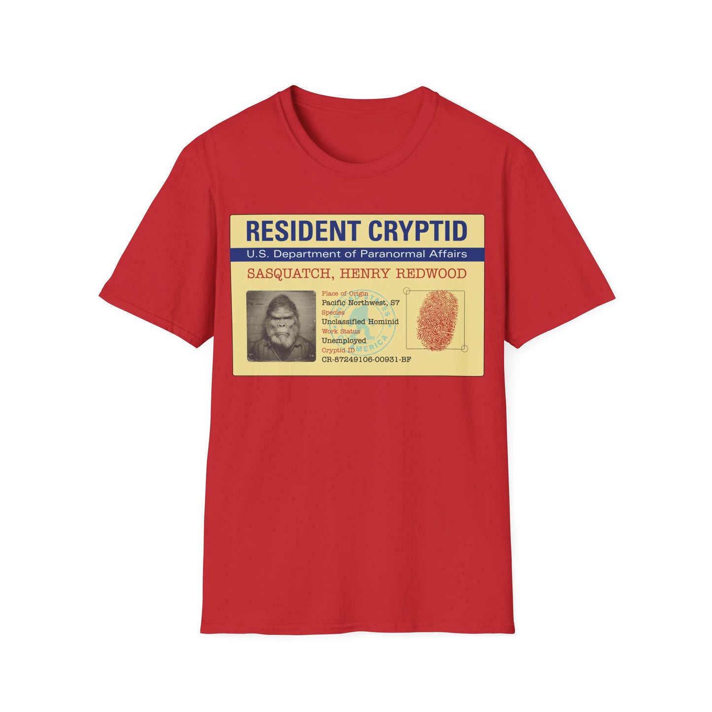 Resident Cryptid ID Card t-shirt design featuring a vintage government style Sasquatch/Bigfoot ID badge with mugshot portrait, fingerprint, and ‘U.S. Department of Paranormal Affairs’ dossier text in beige, blue, and red on a red background